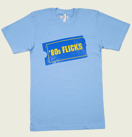 blue and yellow 80s Flicks retro video rental graphic on light blue t-shirt